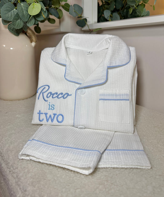 Boys White Suckseeker PJs with Pale Blue Lining Detail